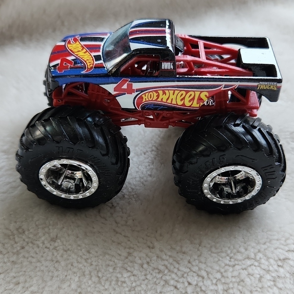 Hot Wheels Racing #4 Monster Jam Truck 4X4 black blue red